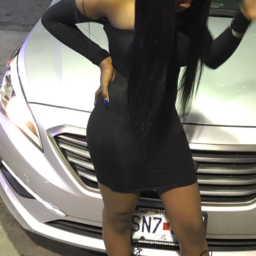 Black formfitting dress for sale !